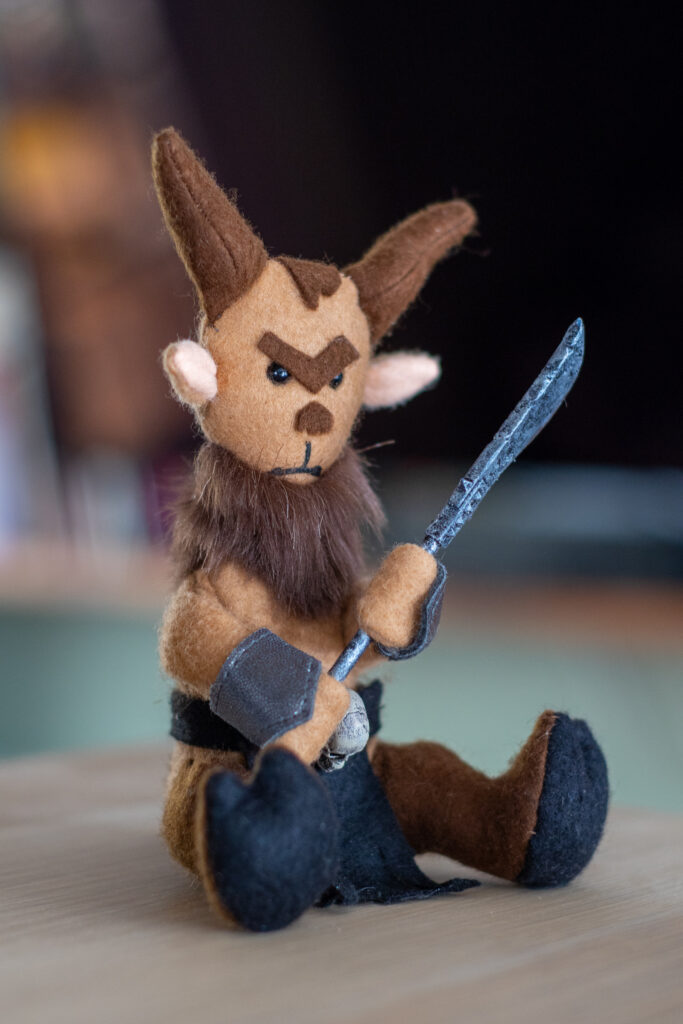 The Jongleurs Dream presents an Ungor, the nimble and cunning herder of the grimdark fantasy world, now reimagined as a premium plushie collectible. This detailed desk display piece captures its iconic horns and agile stance in soft fabric form.