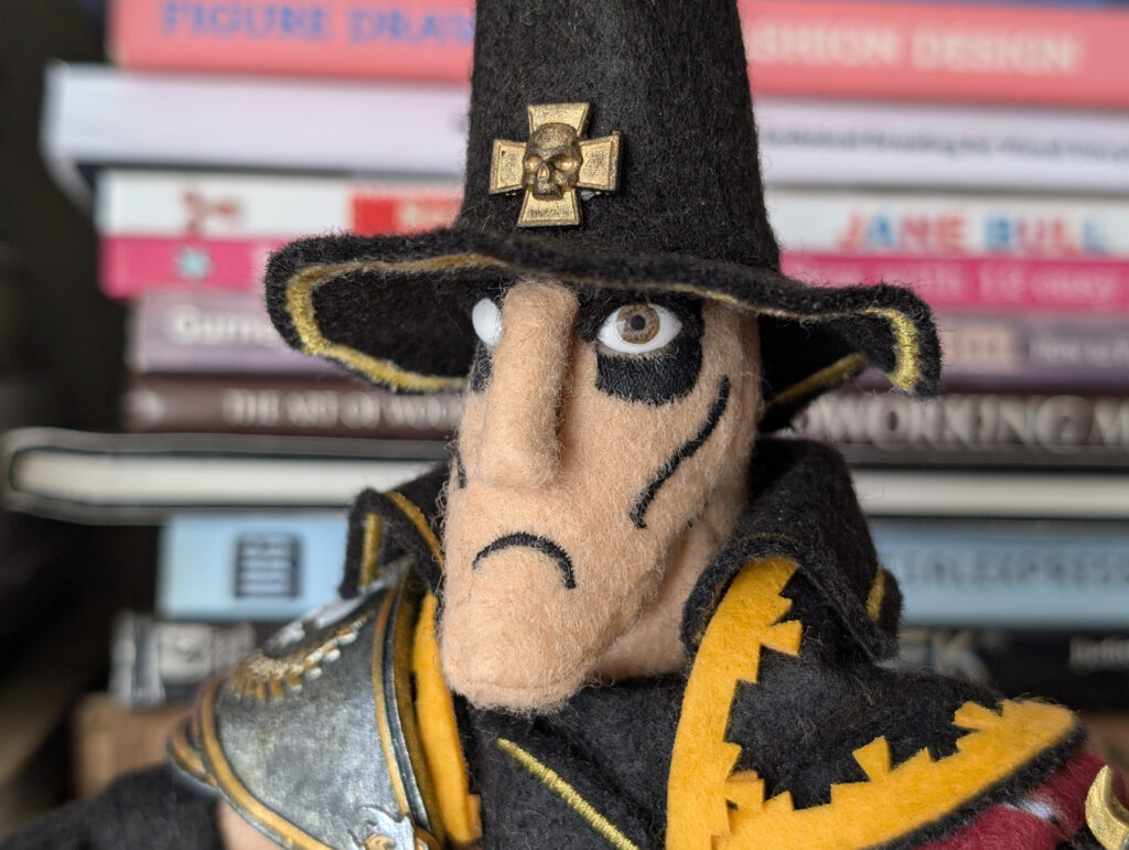 Vermintide Saltzpyre  Handmade felt witch hunter plush inspired by Saltzpyre from Vermintide, wearing a wide-brimmed hat and long coat, made by The Jongleur's Dream